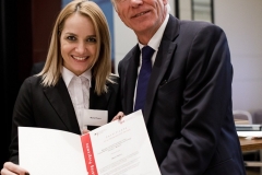 “It changed my entire life”, says Maria Plesca about the Manager Training Programme. On this photo she receives her MP certificate from Heinz Hetmeier (BMWi) © GIZ/Igor Schimbator